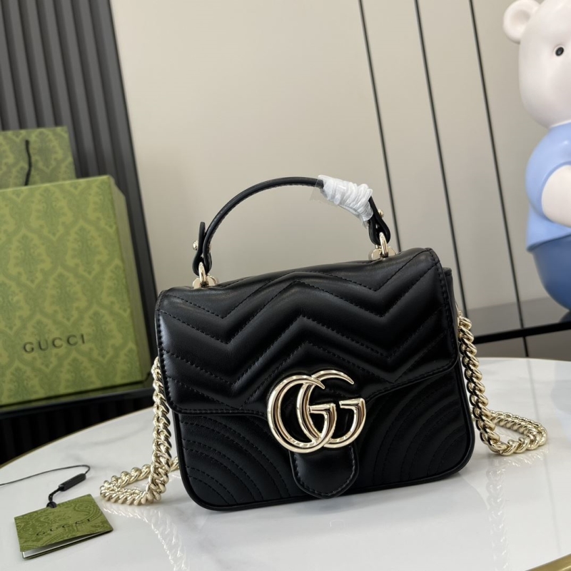 G*u*i top handle bags